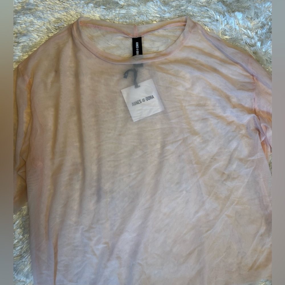 Agnes and Dora beautiful pink mesh top. Never worn, new with tags. Size Medium.
